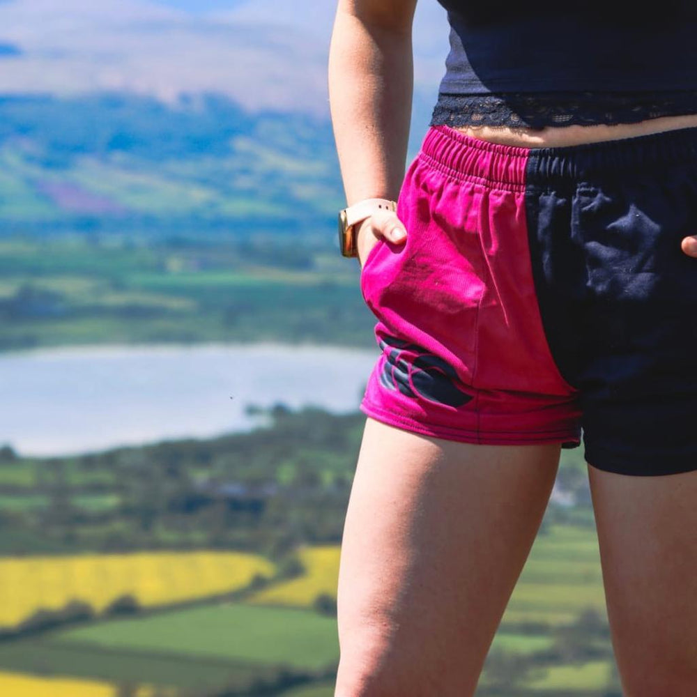 
                  
                    Close photo of Canterbury harlequin shorts worn by a person
                  
                