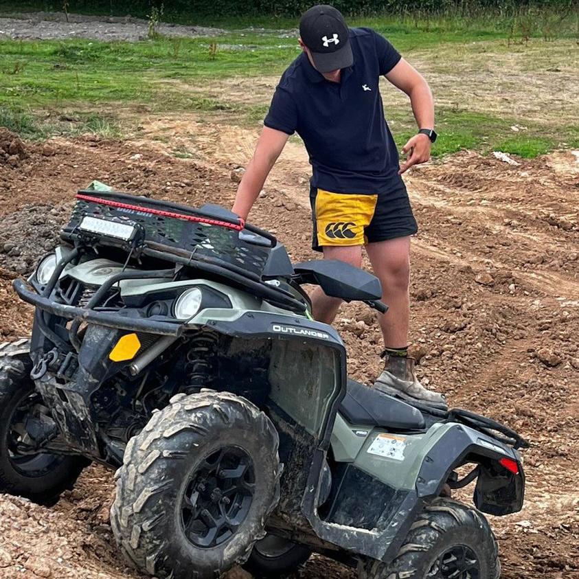 
                  
                    Dirt biker wearing gold and black canterbury shorts
                  
                