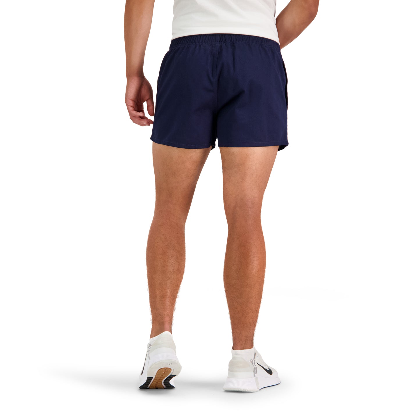 Rear view of man wearing navy Canterbury sportswear