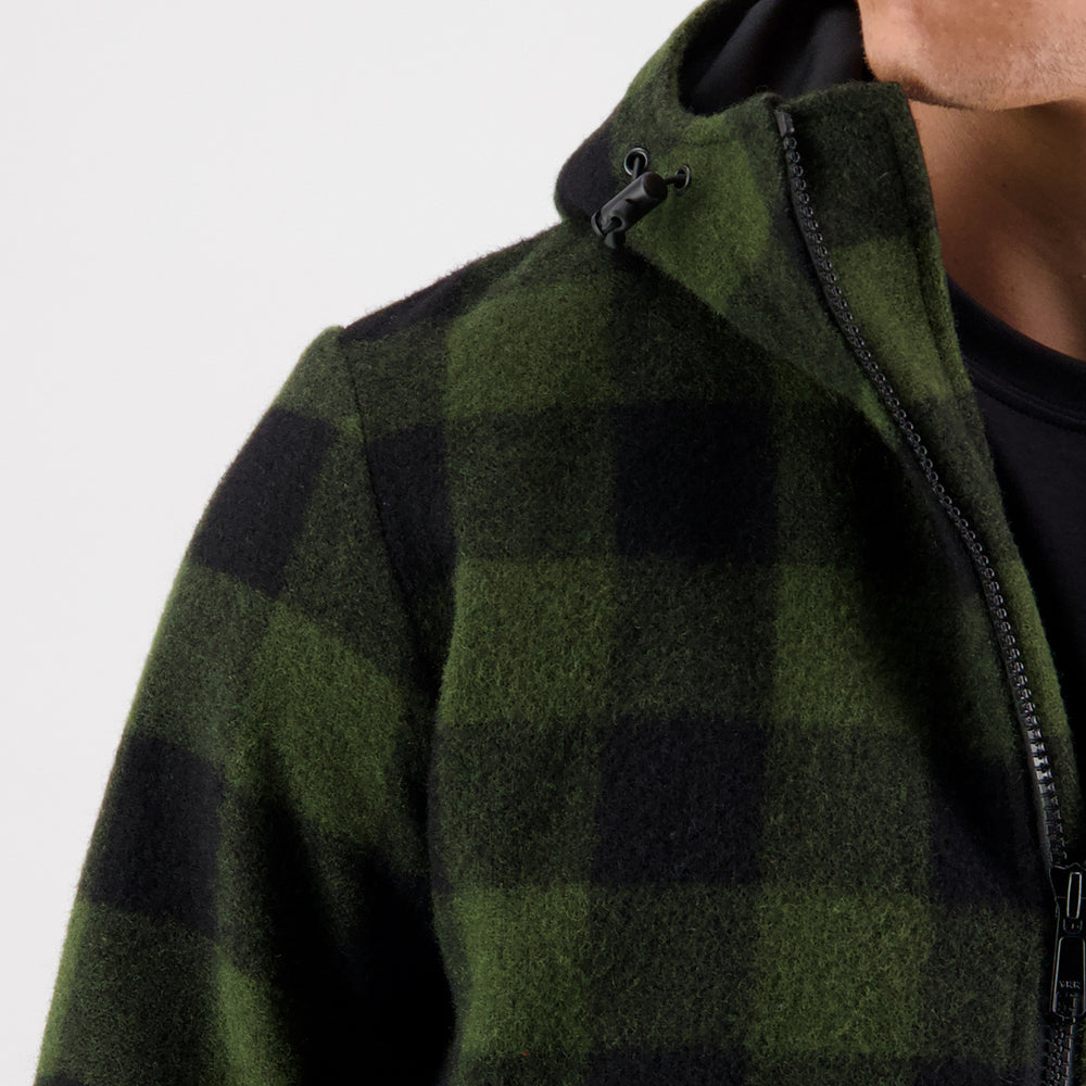 
                  
                    Closeup of man's shoulder wearing Swanndri clothing
                  
                