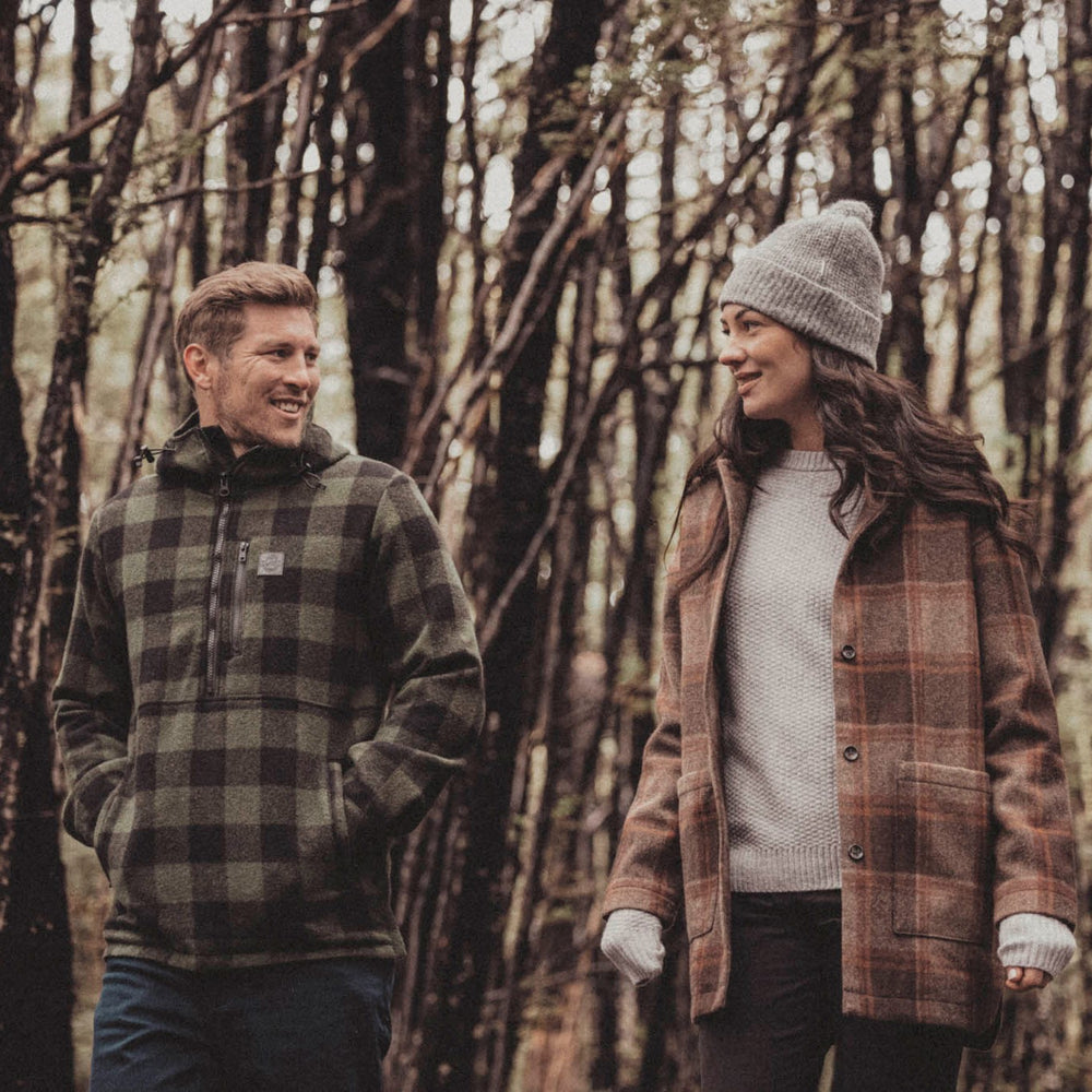 
                  
                    People wearing farming hoodies and walking in the woods
                  
                